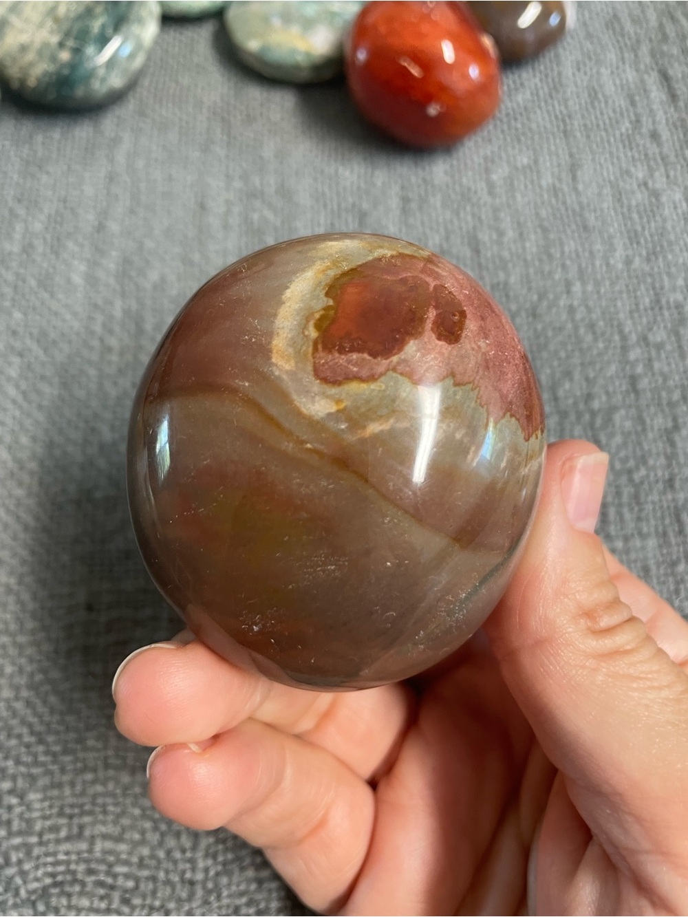 Large polychrome Jasper polished palm stone